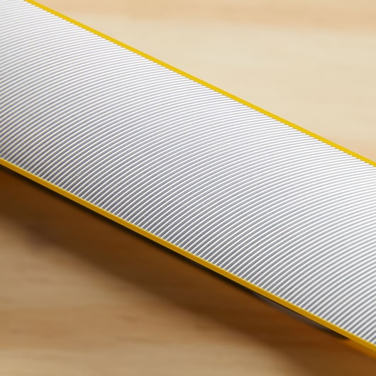 STANLEY 43-572 photography showing a close-up of a yellow-edged ruler with fine black and white measurement lines.