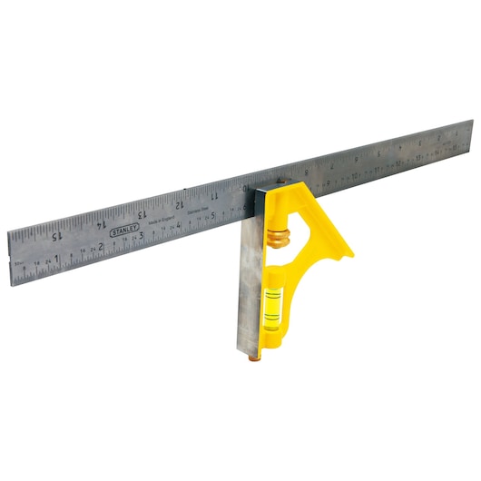 Stanley combination square, side view, with stainless steel ruler and yellow handle, on white background.