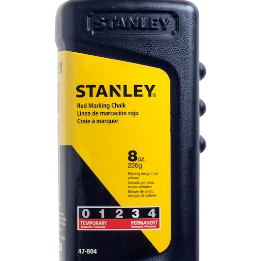 Photo of STANLEY 47-804LA red marking chalk bottle, 8 oz, yellow and black label, product front close-up.