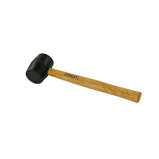Photo of STANLEY 57-516 rubber mallet with black rubber head and wooden handle, side angle on white background.