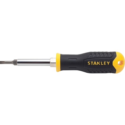 Stanley multitool screwdriver side view with black and yellow handle and chrome shaft on white background.