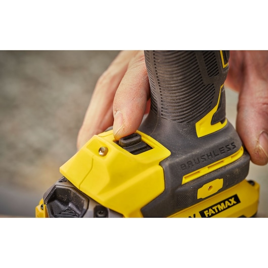 STANLEY SBW920 brushless tool handle close-up, yellow and black with hand operating switch.