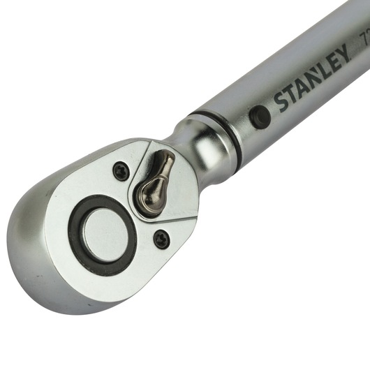 STANLEY STMT73590 chrome ratchet wrench close-up on white background, clearly showing brand and switch mechanism.