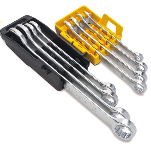 STANLEY STMT78099-8 box end wrench set with seven silver wrenches in yellow and black plastic holder, angled view.