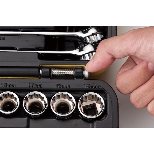 STANLEY STMT82780 socket set photography, close-up showing hand and sockets labeled 16mm to 19mm.