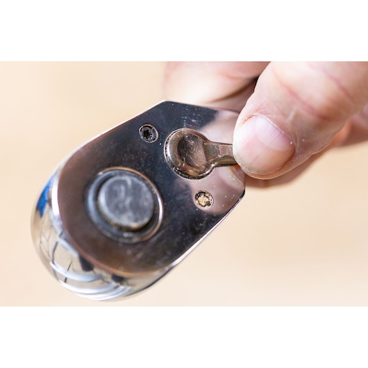 STANLEY STMT82832-1 ratchet head close-up, hand adjusting switch, photography