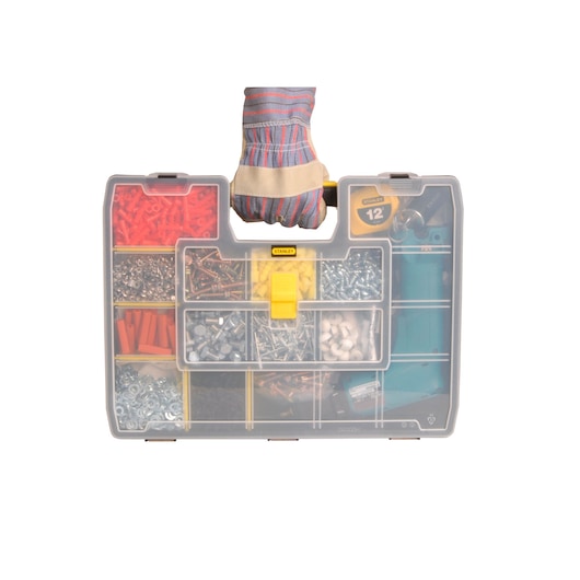 Photo of STANLEY STST14026 organizer box with assorted fasteners, yellow latch, and gloved hand holding the handle, front angle.
