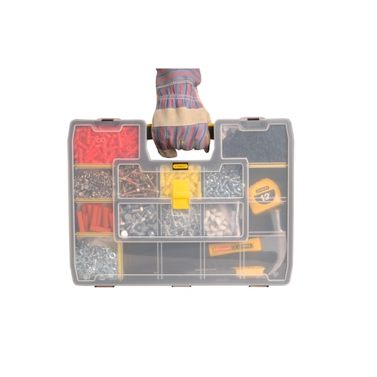 Stanley STST14026 organizer box front view, held by gloved hand, filled with hardware and tools.