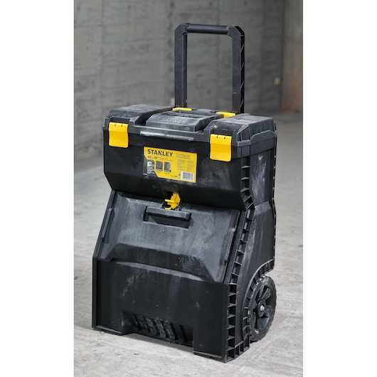 STANLEY STST18800 rolling tool box with yellow latches and black handle, shown at a front angle.