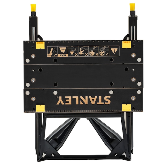 STANLEY STST83400-1 black folding workbench, top angle, yellow details on white background.