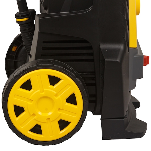 Photo of STANLEY SW19 pressure washer side view showing yellow wheel and black housing.