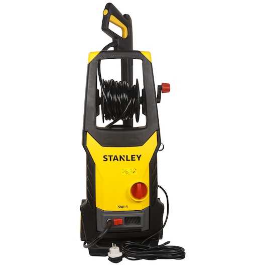 Front angle photo of STANLEY SW19 electric pressure washer, yellow and black with hose reel and attached power cord.
