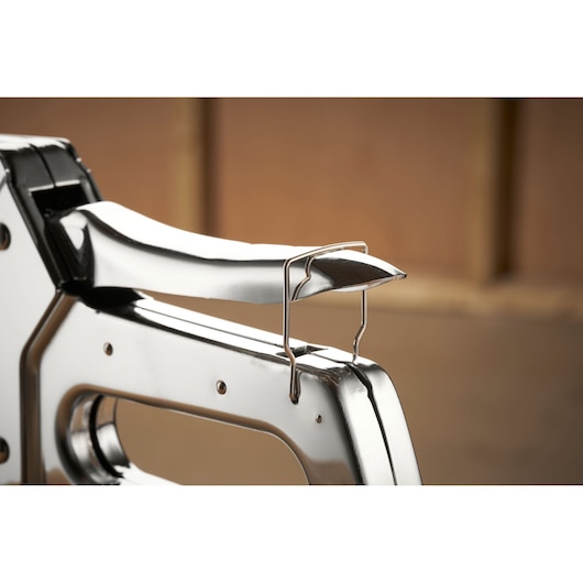 STANLEY TR110 manual staple gun close-up showing chrome finish and safety lock.